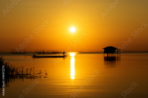 Sunset sky on the lake in south of Thailand., un-focus image. © noppharat