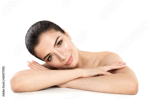 Pretty Young Woman Spa Model. Smiling Woman Relaxing on White Background. Skin Care, Spa treatment and Cosmetology Concept