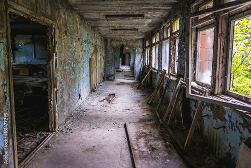 Interior of abandoned school in Pripyat city in Chernobyl Exclusion Zone, Ukraine © Fotokon