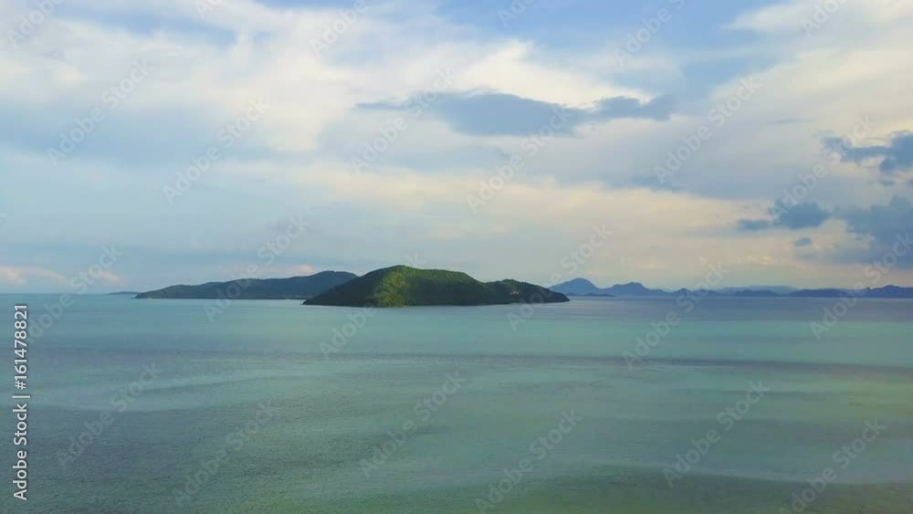 Flying above Sea Surface Towards Tropical Island Flying above Sea Surface Towards Tropical Island