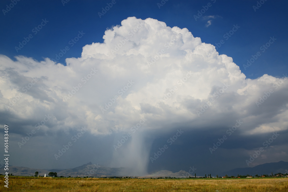 Thunderstorm cloud with falling rain