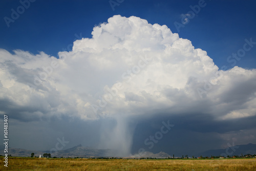 Thunderstorm cloud with falling rain