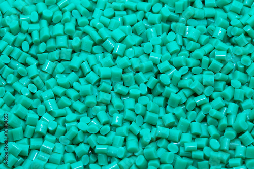 Obraz na płótnie Green plastic polymer granules