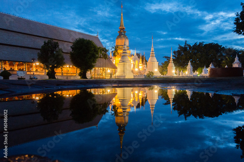 Pagodas reflecting in water  Wat Suan Dok oldest temple in Chiang Mai  Thailand.