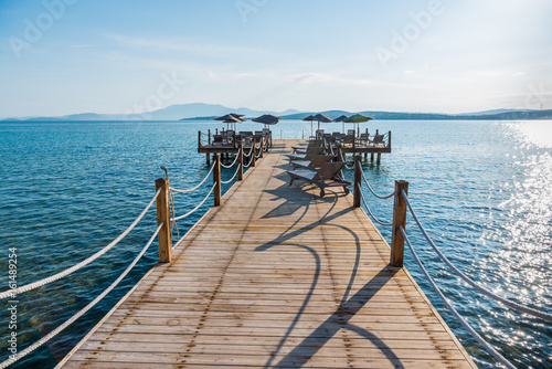 Fototapeta Naklejka Na Ścianę i Meble -  Cesme, Turkey - June 17, 2017 : Ilica Beach view in June. Ilica Beach is popular tourist destination in Turkey.