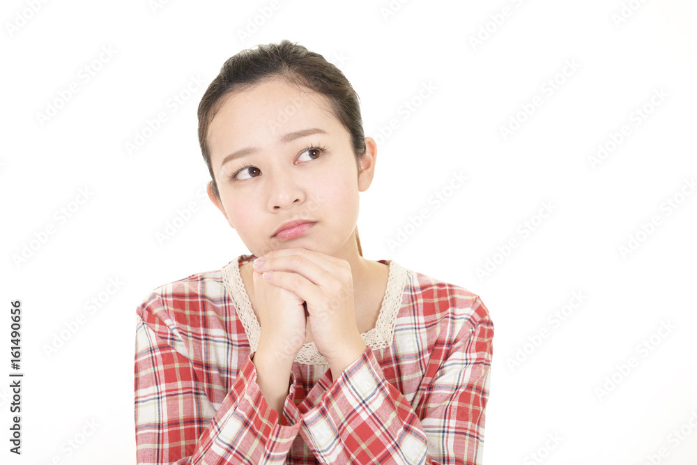 不安そうな表情の女性 不安そうな表情の女性