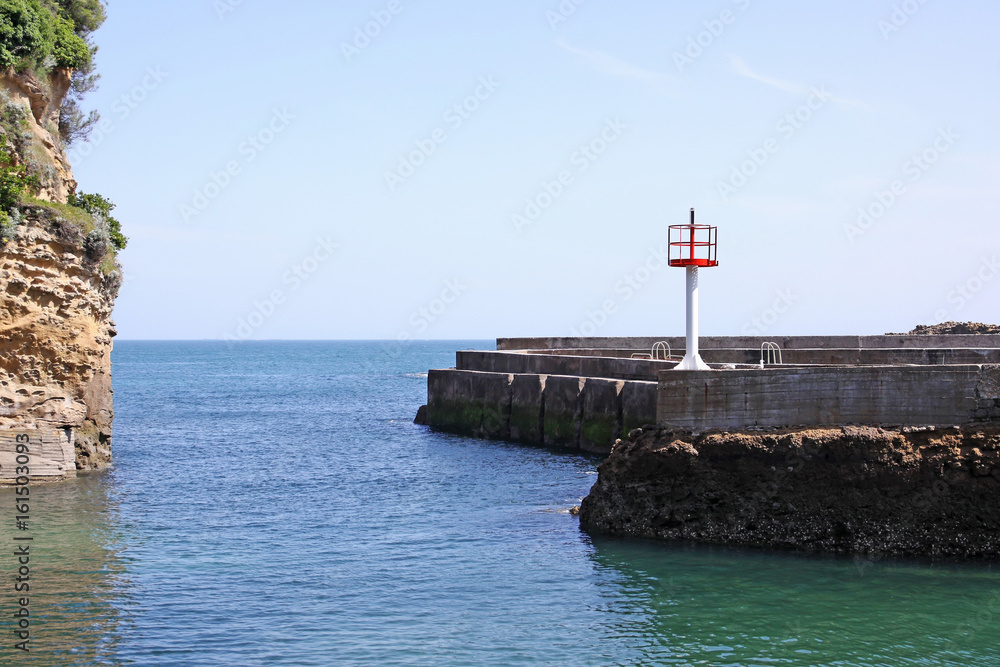 pier light of the fishing port biarritz