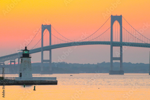 A sunset over the Newport Bridge in Newport, Rhode Island  photo