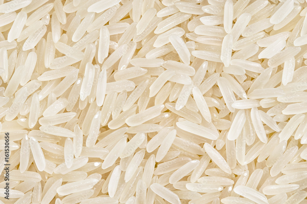 Background of premium parboiled rice. Сlose up, top view, high resolution product. Healthy food concept
