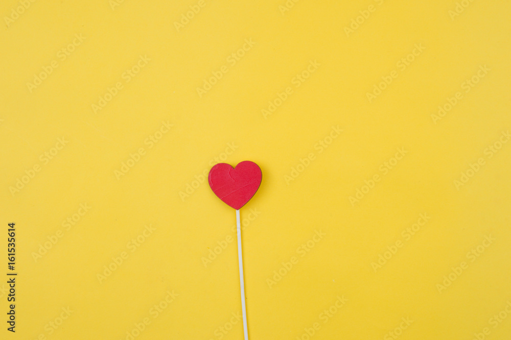 Valentines day concept. red glitter hearts on yellow background. Flat lay composition