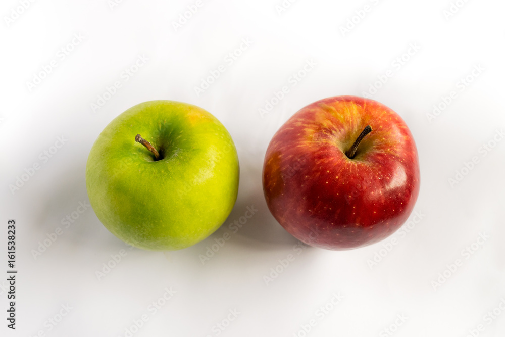 Two apples a green and a red in up view. Different concept. Two different things. Two apples a green and a red in up view. Different concept. Two different things.