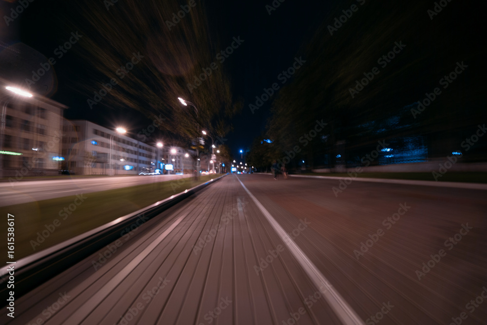Blurred lights, view of the road, shooting at long exposure. Blurred lights, view of the road, shooting at long exposure.