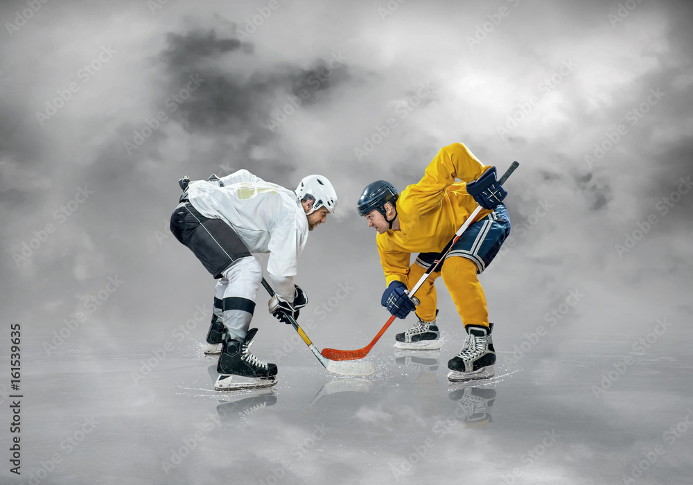 Fototapeta premium Ice hockey player on the ice, outdoors