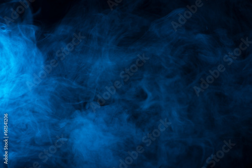 Blue smoke texture on a black background