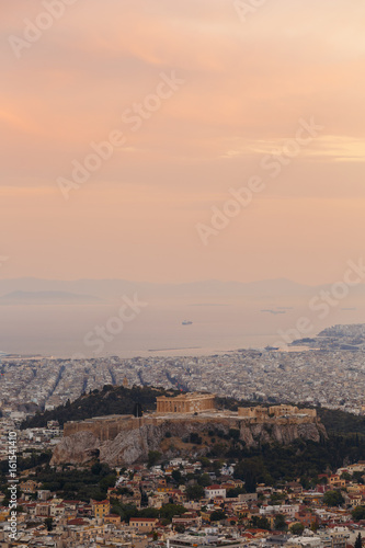 View of Athens and Acropolis from Lycabettus hill at sunset, Greece.    © milangonda