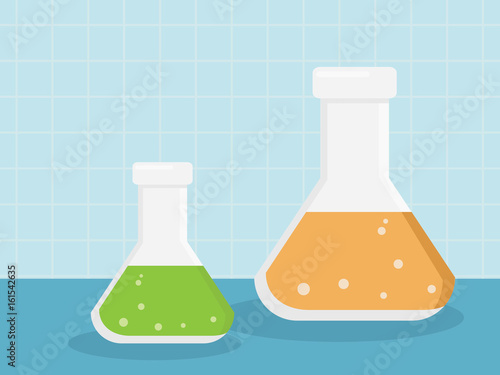 Laboratory glassware with liquids of different colors