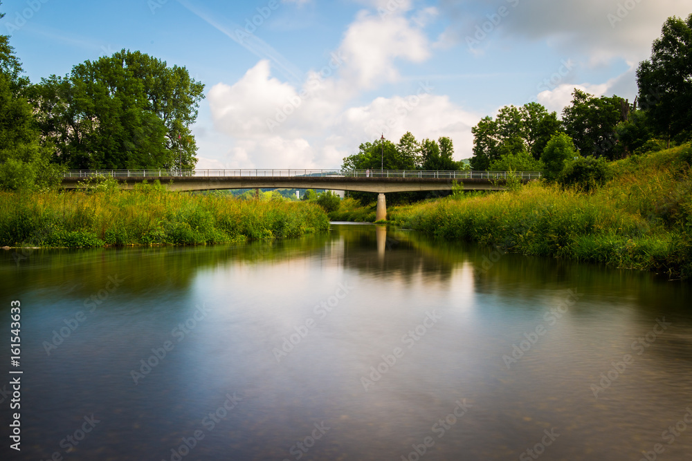 View of the bridge behind the weir View of the bridge behind the weir