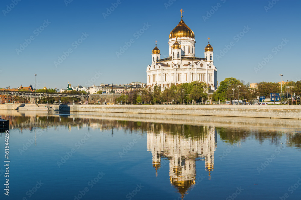 Morning panoramic view of Moscow Cathedral of Christ the Savior, Moskva river and embankment from Bolshoi Kamenny bridge in Moscow, Russia. Morning panoramic view of Moscow Cathedral of Christ the Savior, Moskva river and embankment from Bolshoi Kamenny bridge in Moscow, Russia.