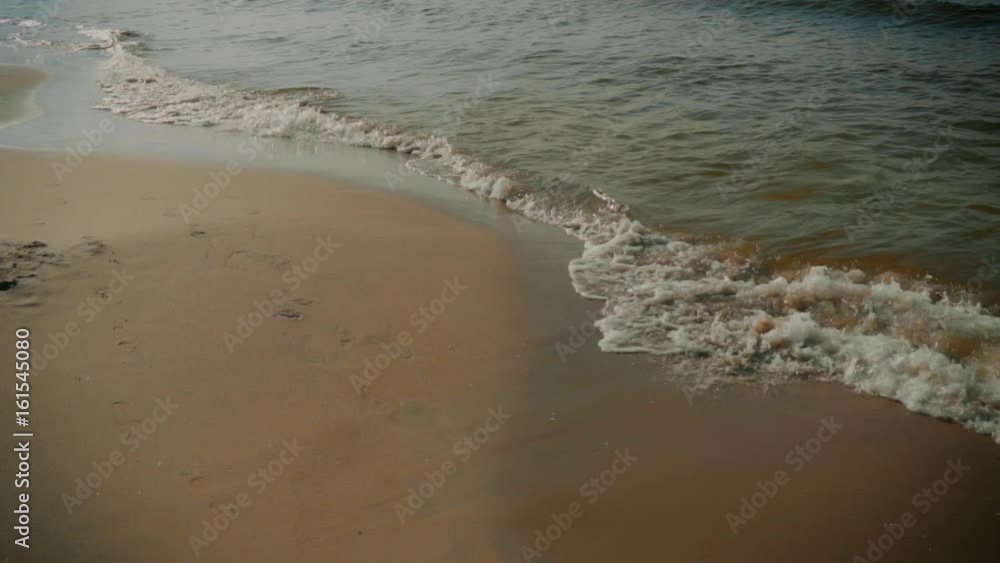 Beautiful view of the beach and sea waves in summer Beautiful view of the beach and sea waves in summer
