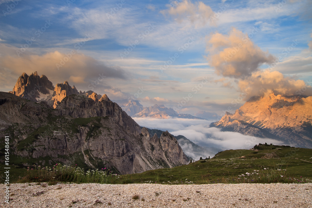 Fototapeta premium Dolomites sunrise above clouds