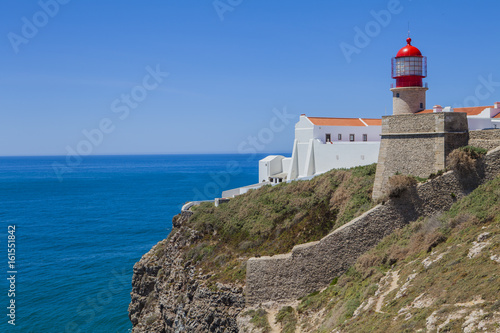 Lighthouse at Cabo de Sao Vicente, Algarve, Portugal. The lighthouse is situated on the tip of the Cape of St. Vincent, the extreme southwesternmost point in Europe
