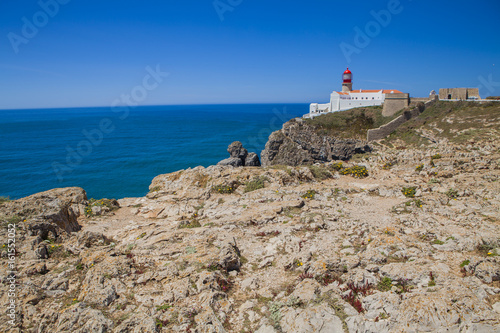Lighthouse at Cabo de Sao Vicente, Algarve, Portugal. The lighthouse is situated on the tip of the Cape of St. Vincent, the extreme southwesternmost point in Europe
