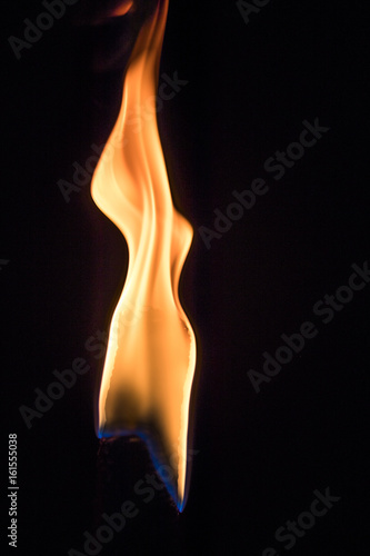 flame of a torch in the darkness