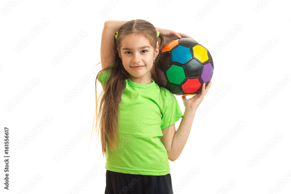 cutie little girl with multicolor soccer ball in hands