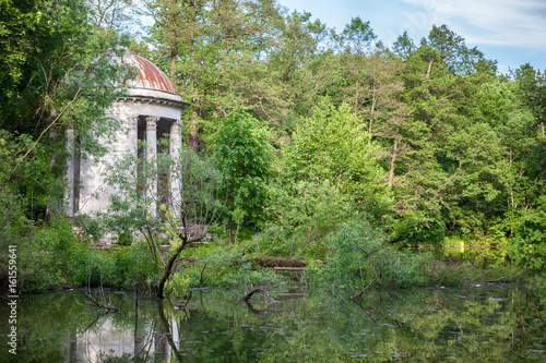 gazebo with columns in the classical style in the park