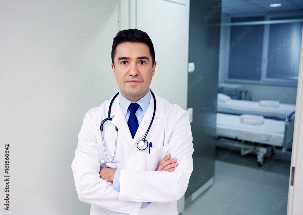 doctor with stethoscope at hospital corridor doctor with stethoscope at hospital corridor