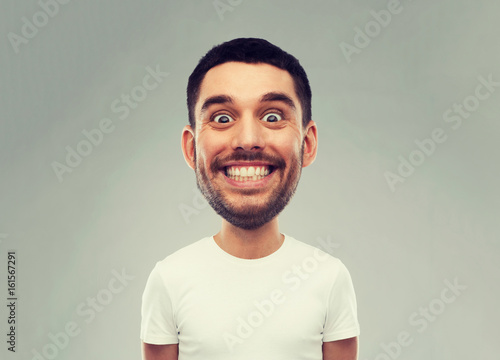man with funny face over gray background photo