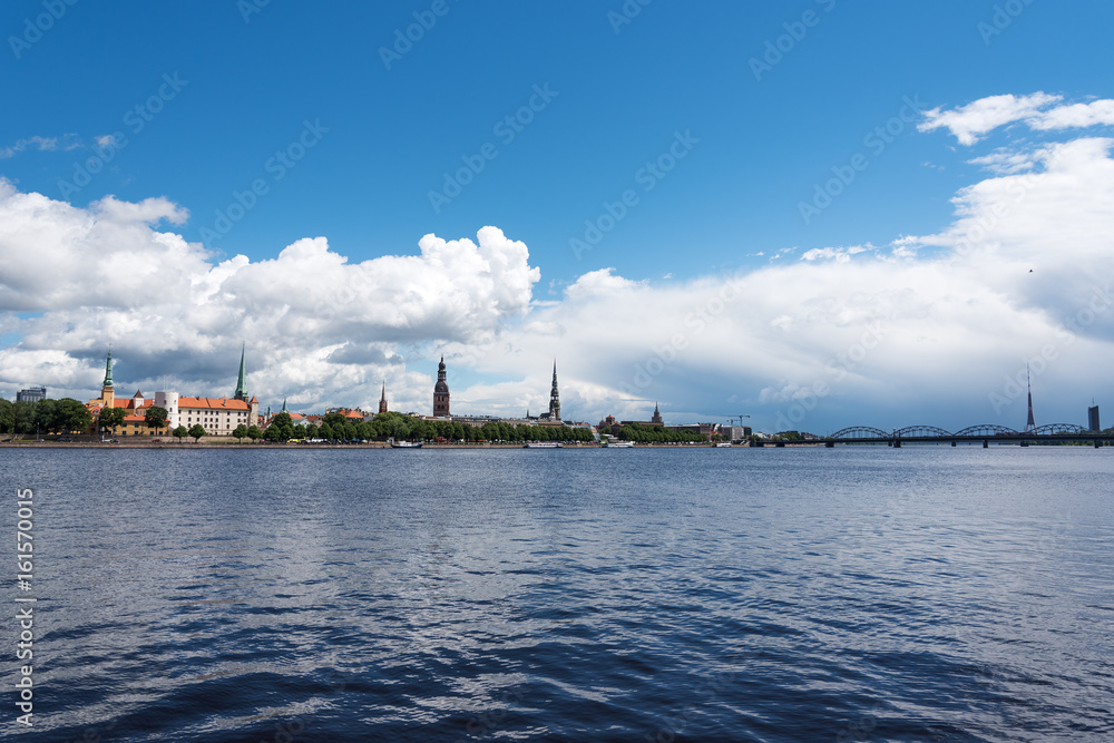Riga city skyline across river Daugava, Latvia.
