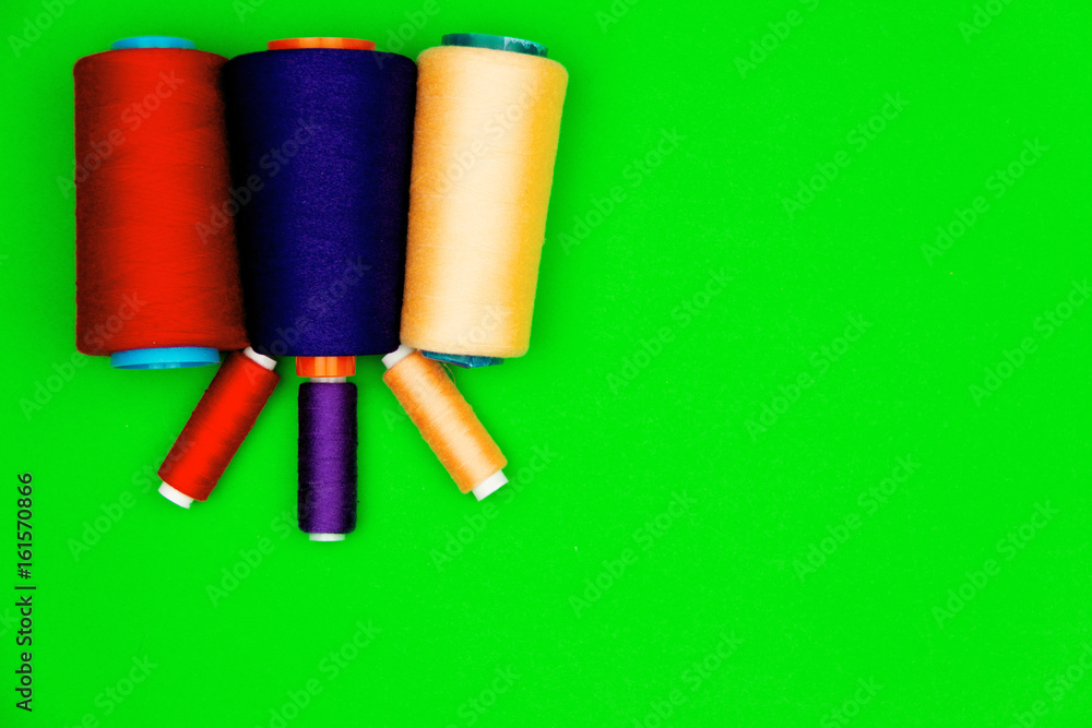Sewing concept. Colorful sewing spools Sewing concept. Colorful sewing spools