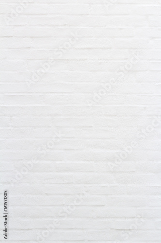 White brick wall for texture or background, vertical