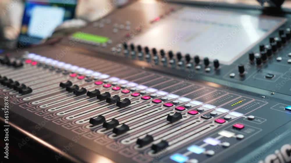 audio mixer in a studio, the automatic knobs moving. Everything is ready for the recording. Soundboard knobs. Digital Sound Mixer In The Disco. Professional audio mixer. audio console in work audio mixer in a studio, the automatic knobs moving. Everything is ready for the recording. Soundboard knobs. Digital Sound Mixer In The Disco. Professional audio mixer. audio console in work