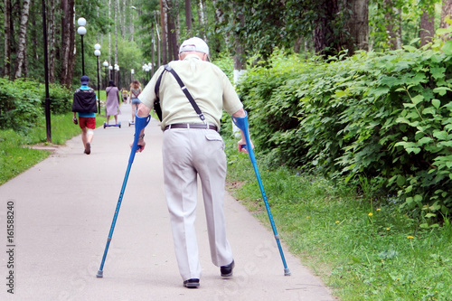 Grandfather with crutches