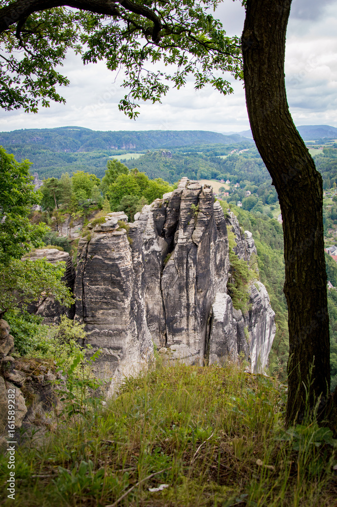 Bastei to river Elbe and Rathen, Saxon Switzerland, Germany - Die Bastei im Elbsandsteingebirge - Sächsische Schweiz Bastei to river Elbe and Rathen, Saxon Switzerland, Germany - Die Bastei im Elbsandsteingebirge - Sächsische Schweiz