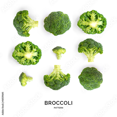 Creative layout made of broccoli. Flat lay. Food concept. Vegetables isolated on white background.
