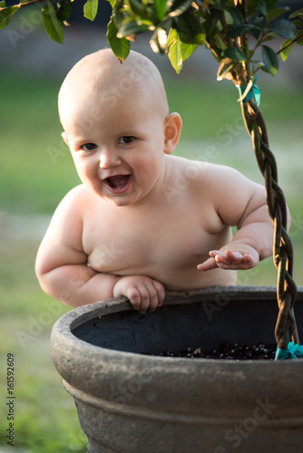 Baby Boy playing in the Garden