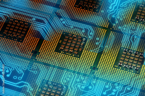 Fototapeta computer processors and blue electronic circuit with lighting effects postproduction, background.