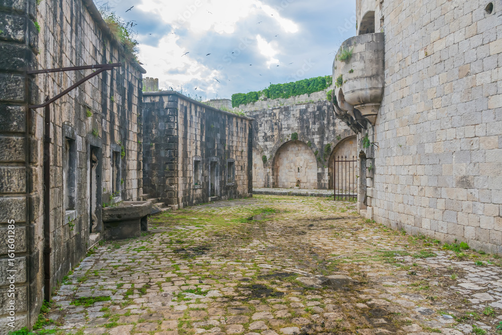 The courtyard is in the military fortress of Mamula. Montenegro, Boka-Kotor Bay. The courtyard is in the military fortress of Mamula. Montenegro, Boka-Kotor Bay.