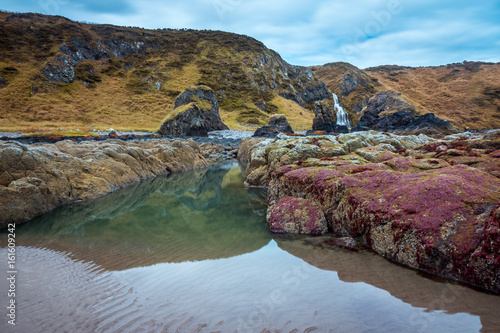 St Cyrus beach pool and waterfall.