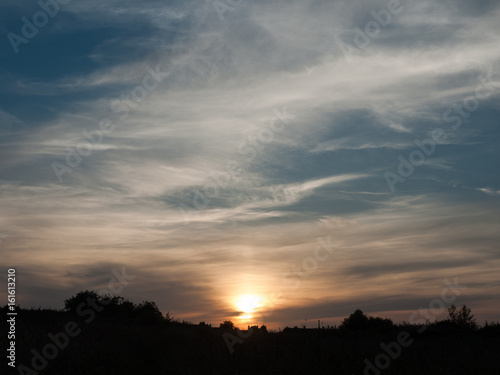 sunset over a meadow outside in england