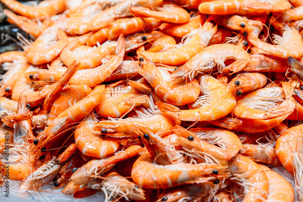 Fresh Fishes And Seafood On Ice In Fish Market Fresh Fishes And Seafood On Ice In Fish Market