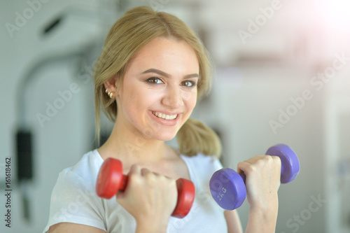 young woman training in gym
