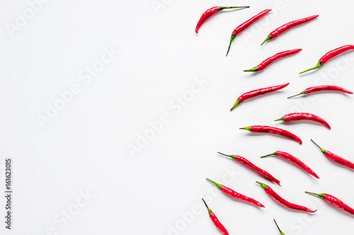 red chili pepper or paprika on white background top view space for text