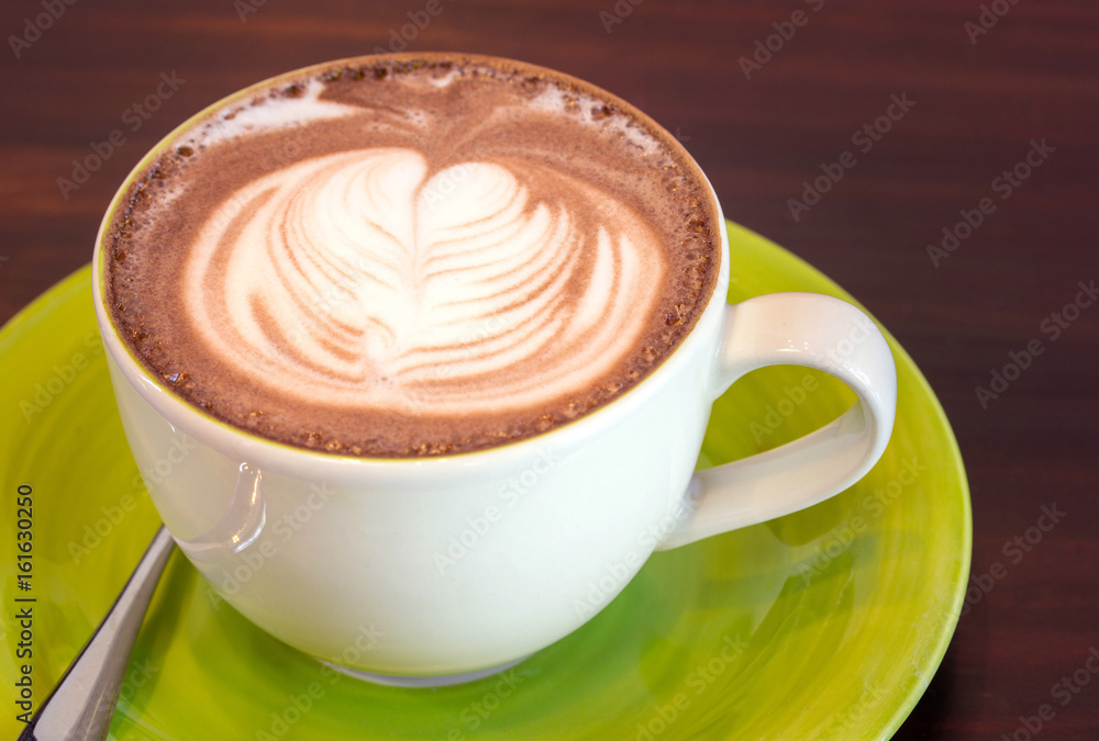cup of coffee on table cup of coffee on table