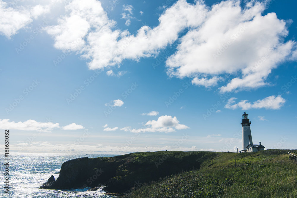 A lighthouse overlooking the ocean.