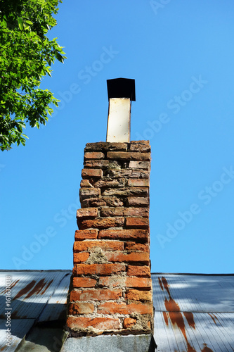 Chimney on the roof photo