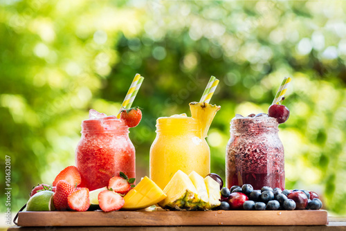 Photos 3 delicious slushies from different berries and fruits